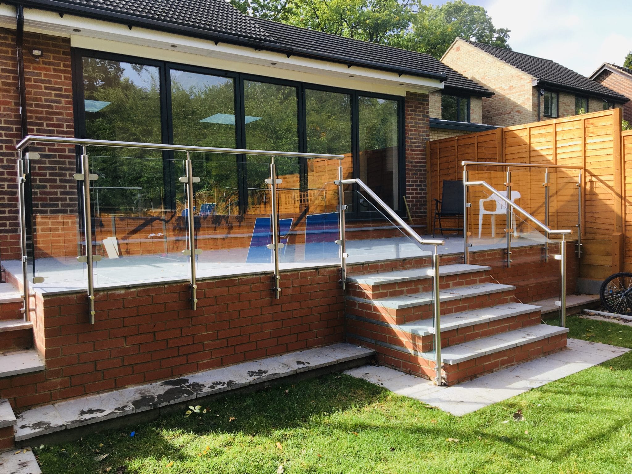 Stainless steel post and handrail glass balustrade