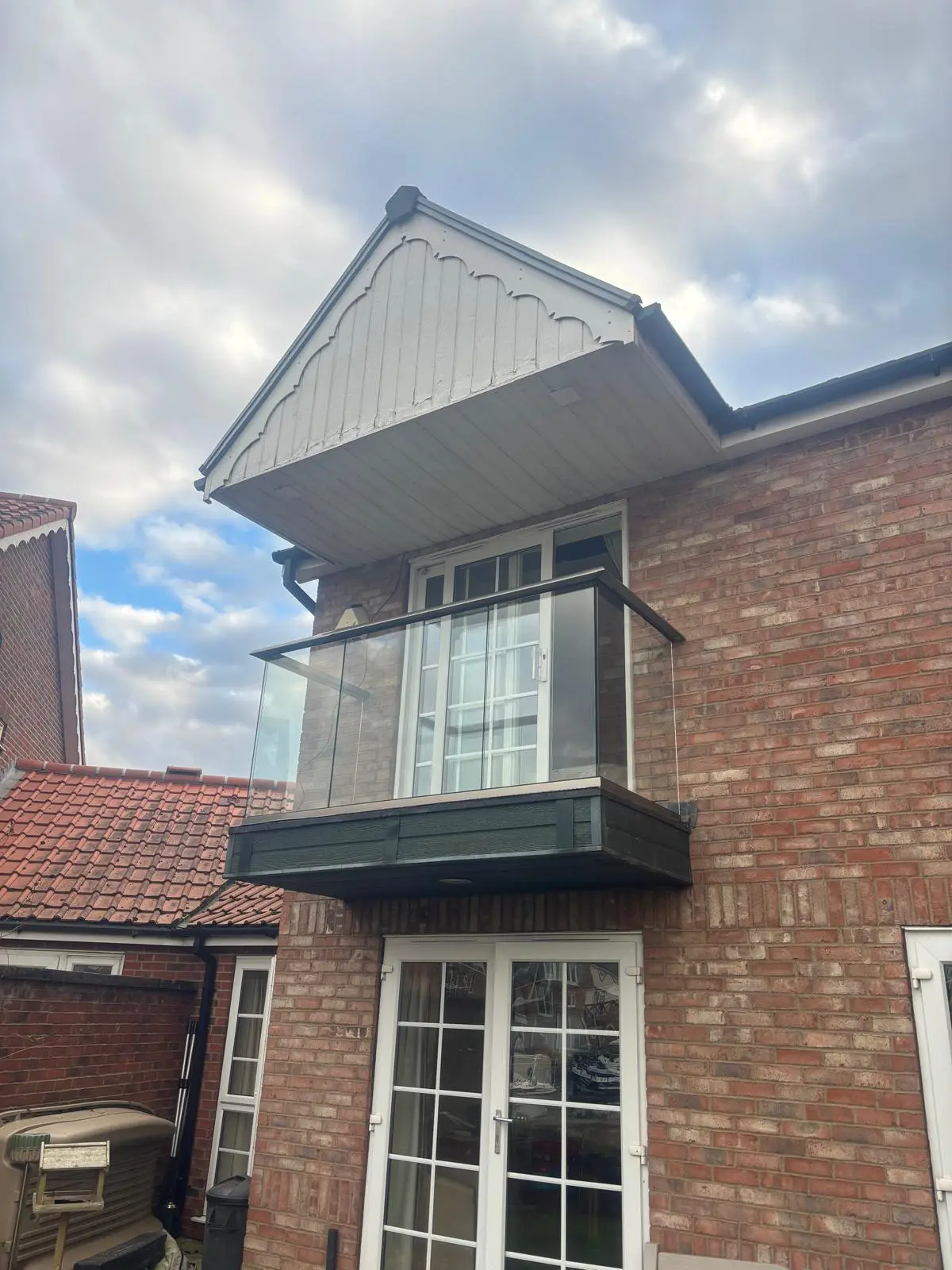 New aluminium glass balcony Burton Waters after replacement