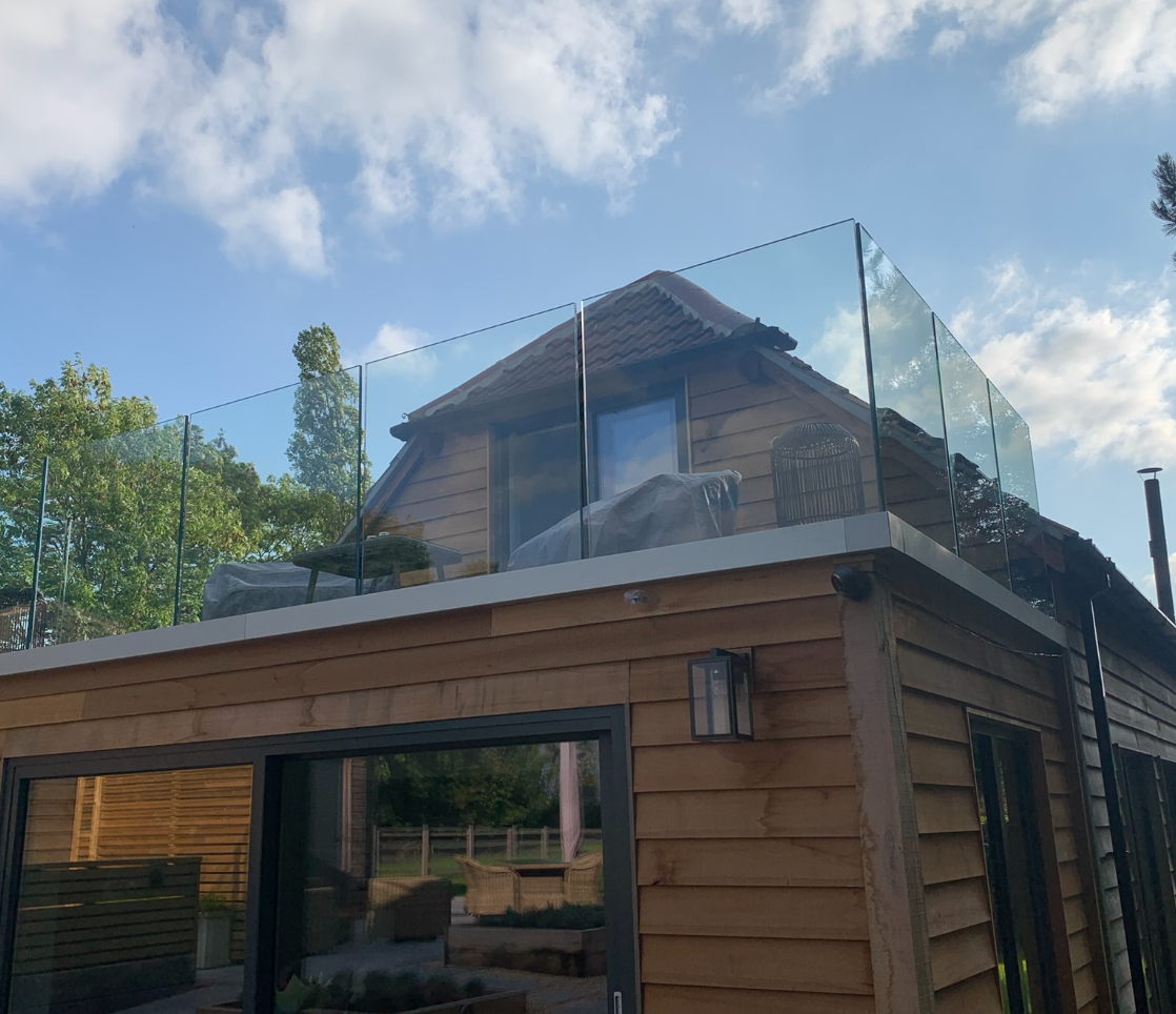 Face mount channel system for glass balustrade