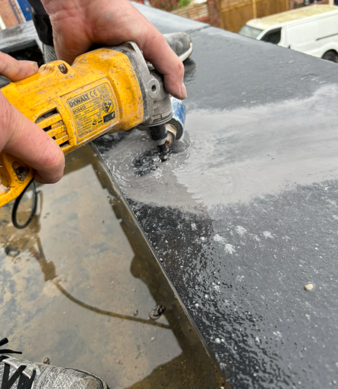 Diamond core drilling through porcelain tile for glass balustrade spigot fixing