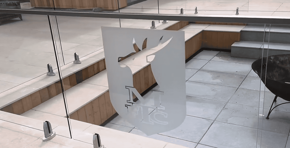 Spigot system frameless glass balustrade on decking and porcelain