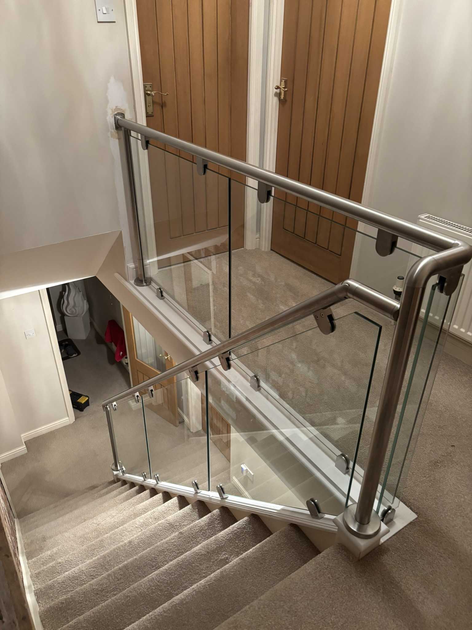 Stainless steel and glass staircase