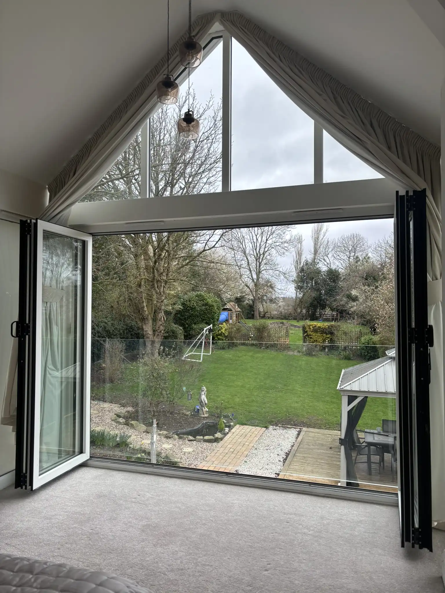 3000mm glass Juliet balcony installation in Heanor using Elegance system with bespoke steel supports