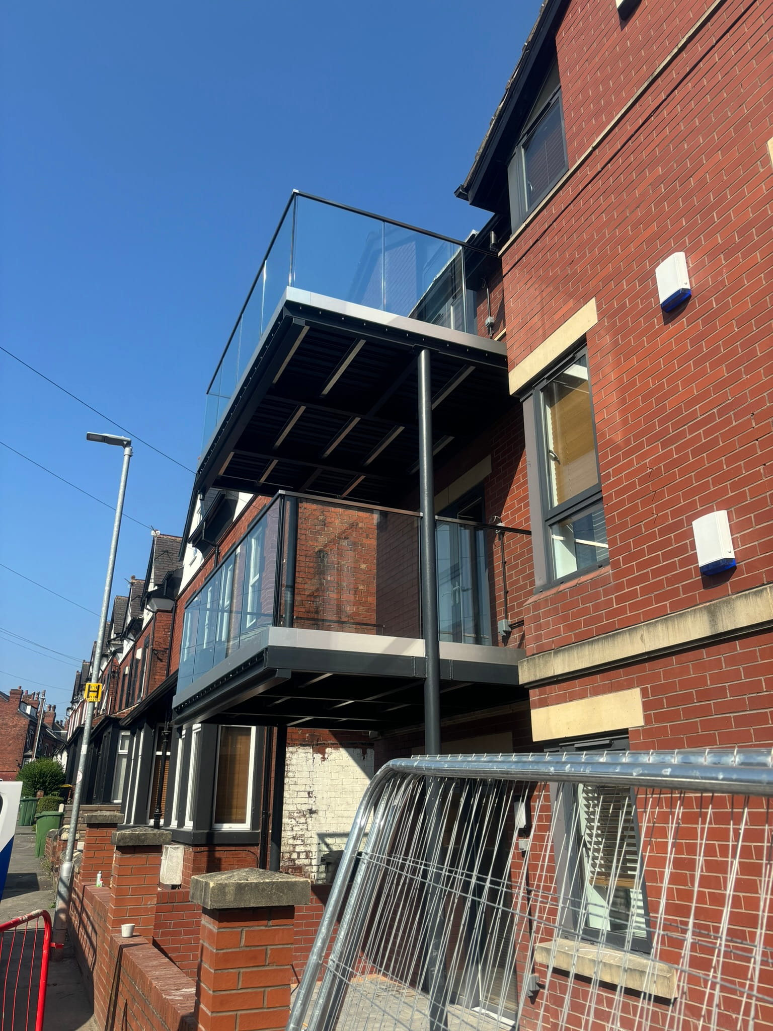 Completed frameless glass balustrade installation on walk-out balcony — Sheffield