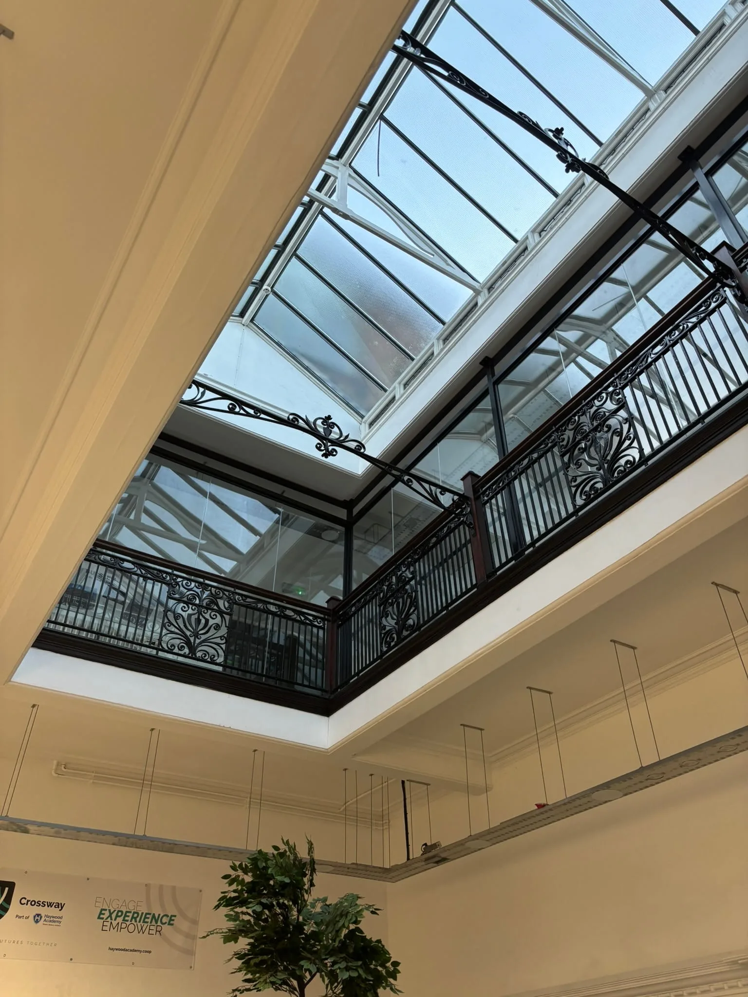 Laminated glass panels providing fall protection in school setting