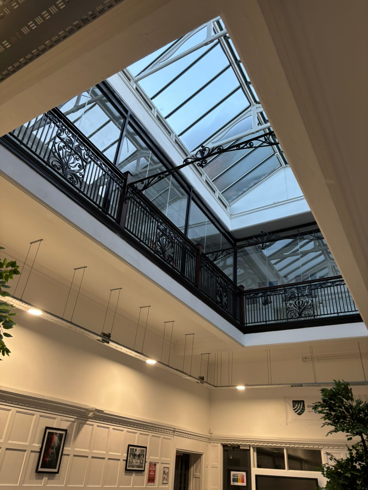 Glass safety barrier installation overview — full run along internal balustrade, Burslem School of Art