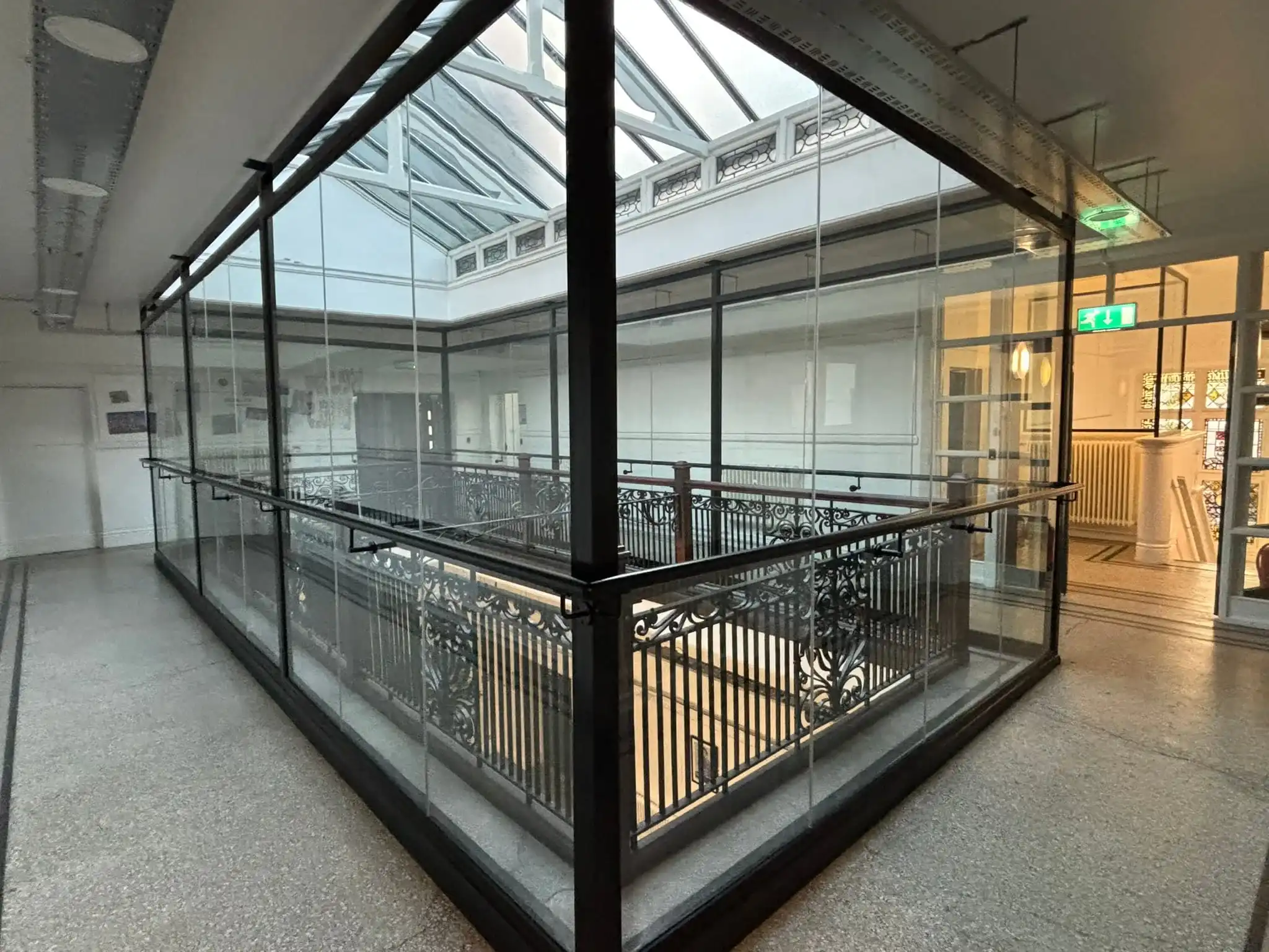 Internal balcony safety barrier with clear laminated glass