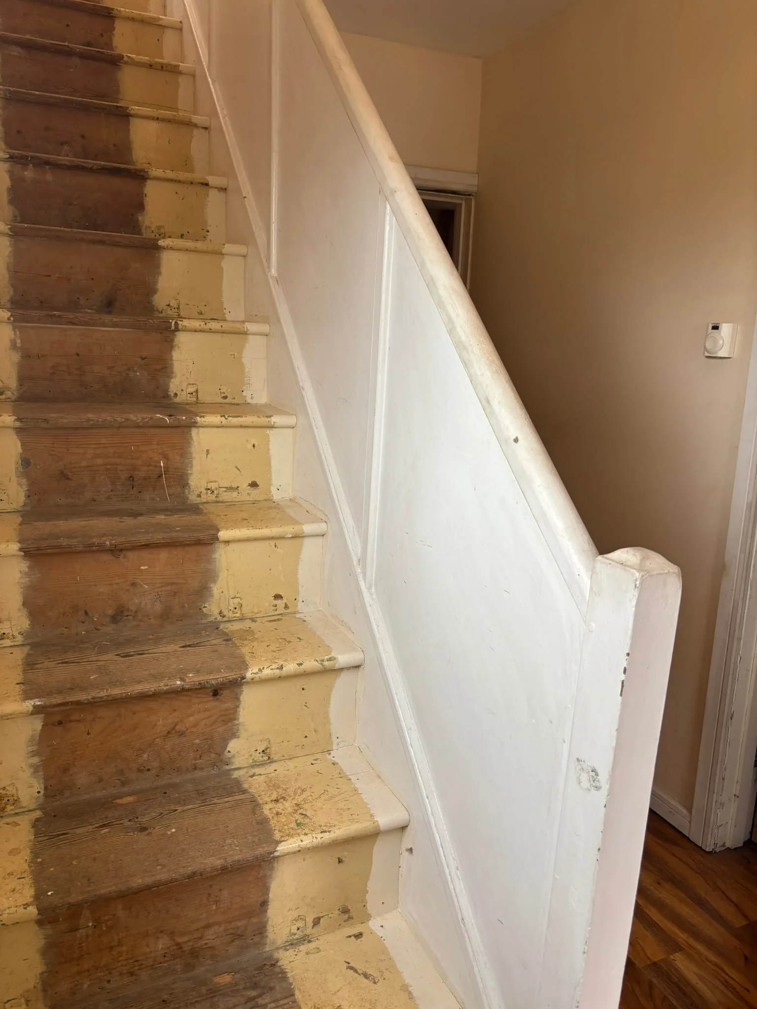 8mm toughened glass panels set into grooved oak handrail and base rail