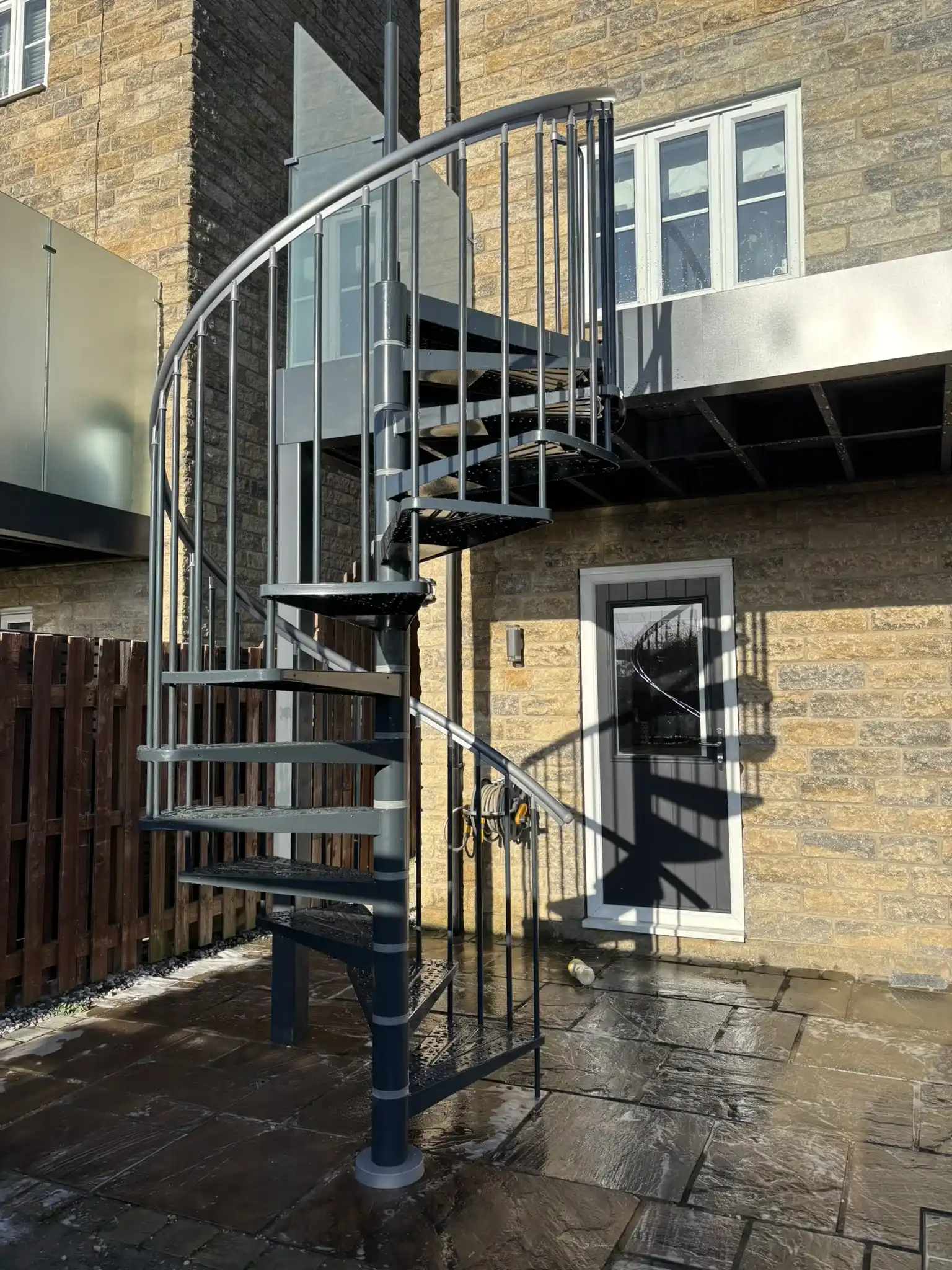 Frameless glass panels providing unobstructed garden views